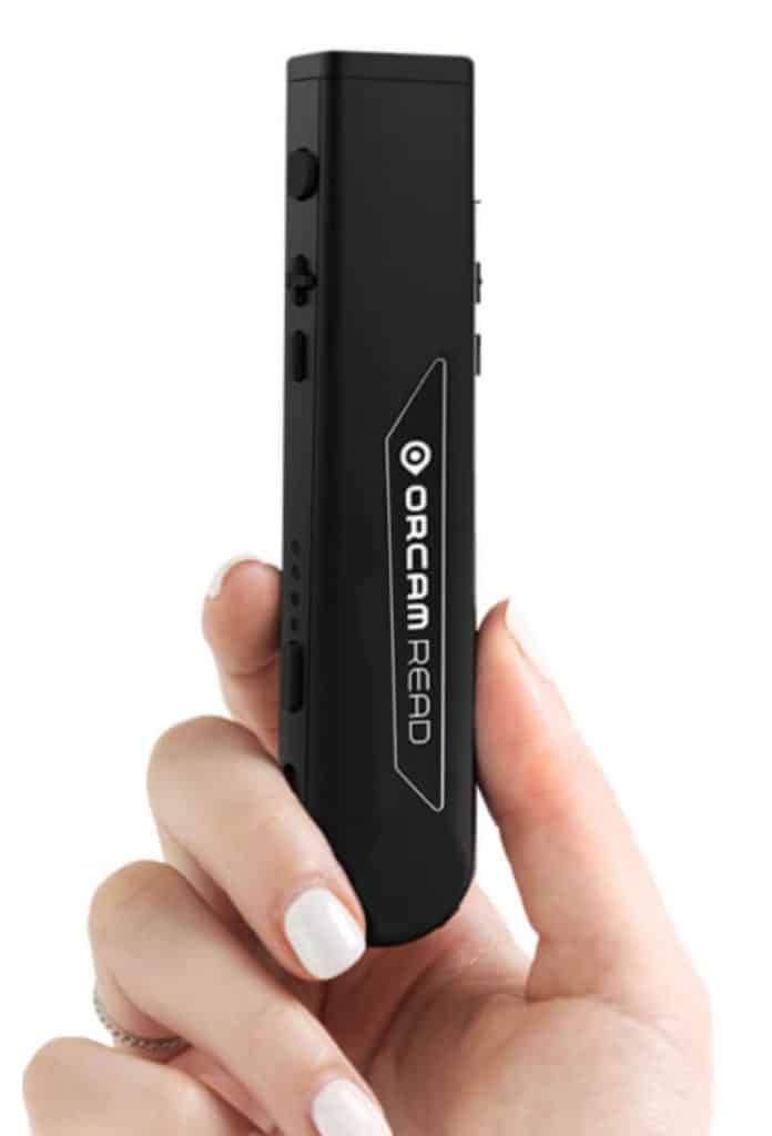 Image of the OrCam Read held in a hand
