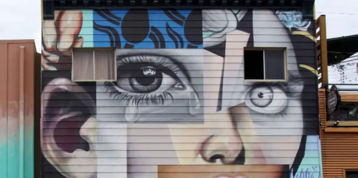 image of eyes painted on an outdoor as a mural