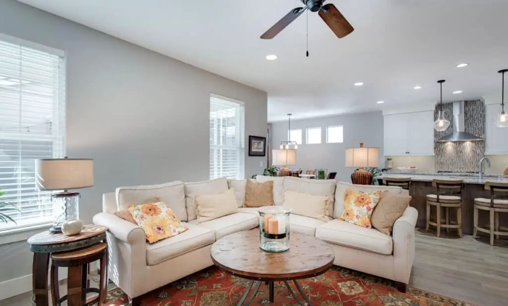 Image of a bright living room and kitchen area