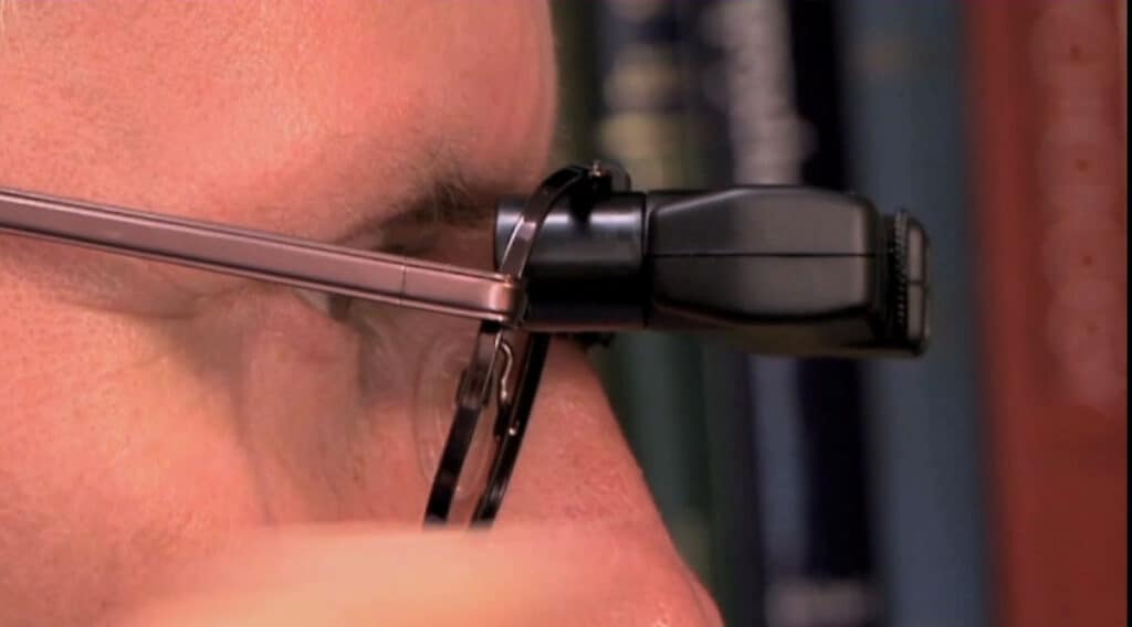 Profile of a man wearing an Ocutech bioptic telescope