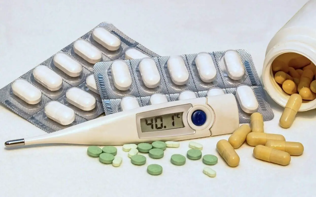 image of pills, tablets and thermometer